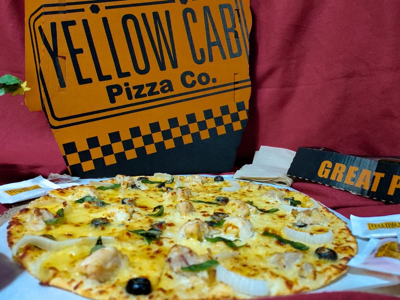 new yellow cab chicken alfredo pizza